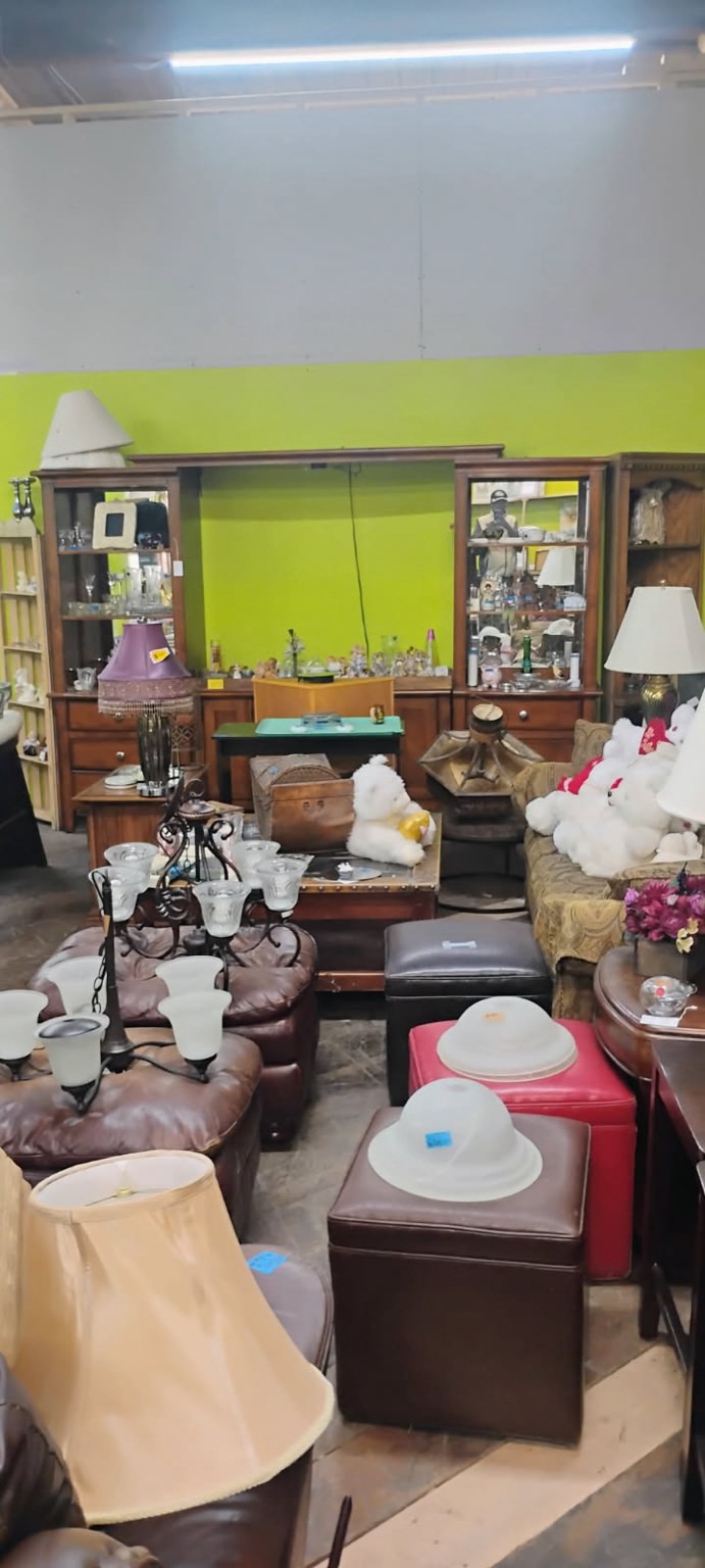 Sofas and lamps area inside J&B Thrift Store